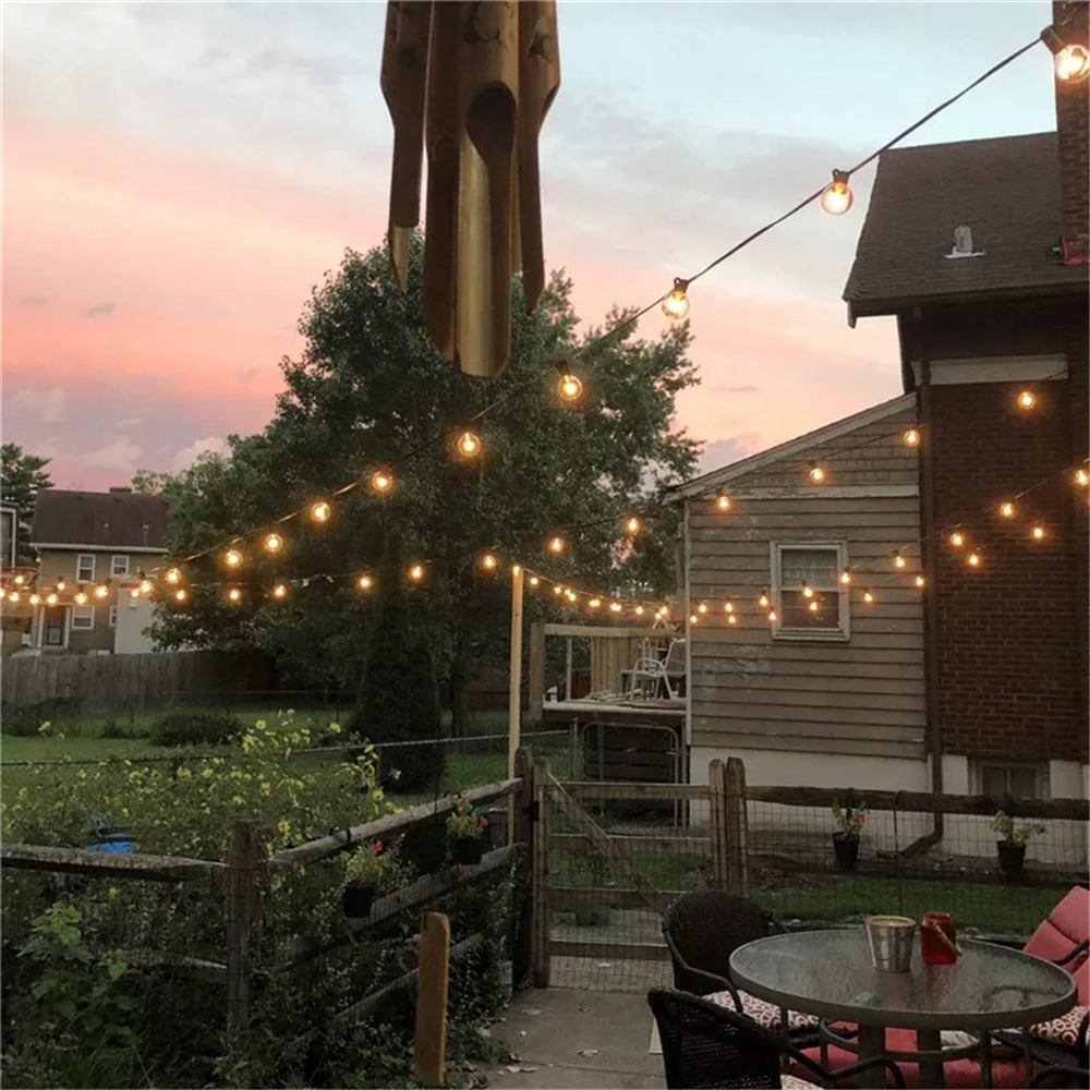 luminaire exterieur chaleureux terrasse
